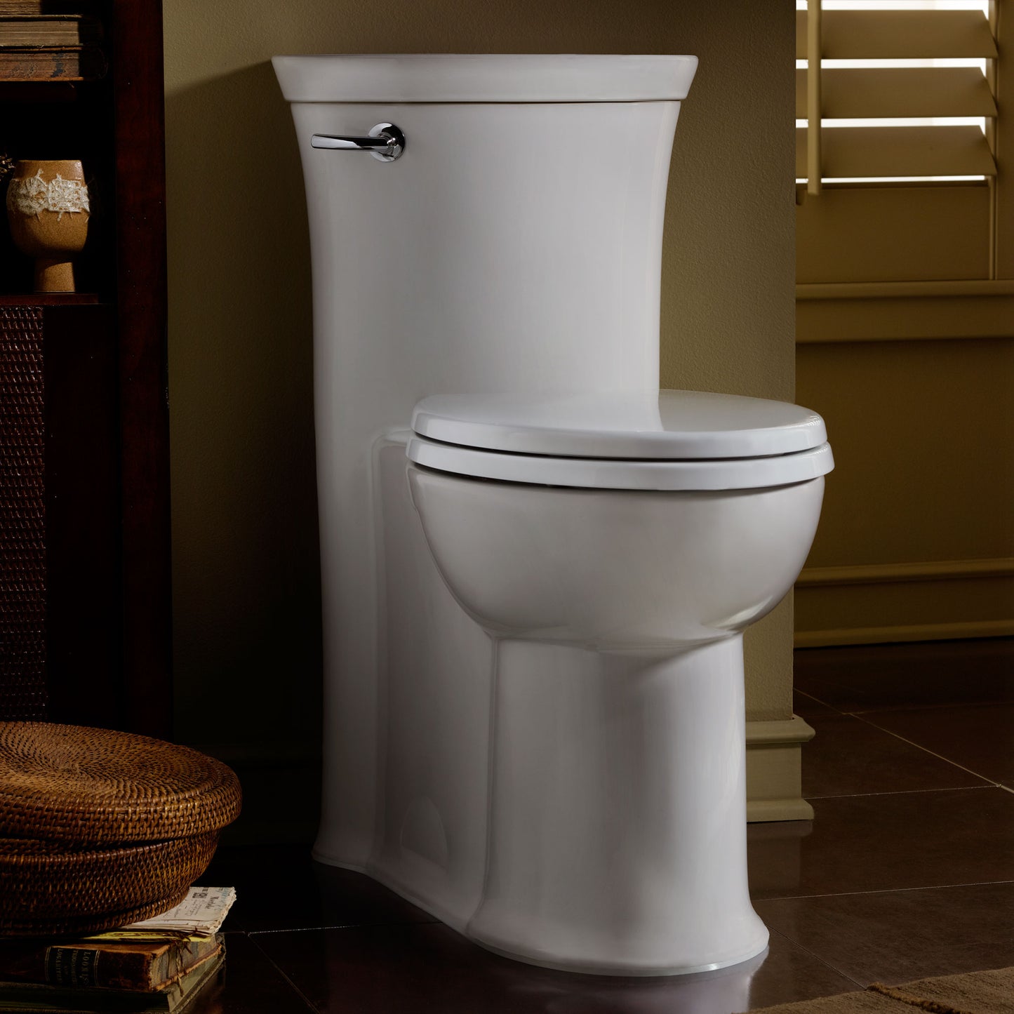 American Standard Tropic One-Piece 1.28 gpf/4.8 Lpf Chair Height Elongated Toilet With Seat